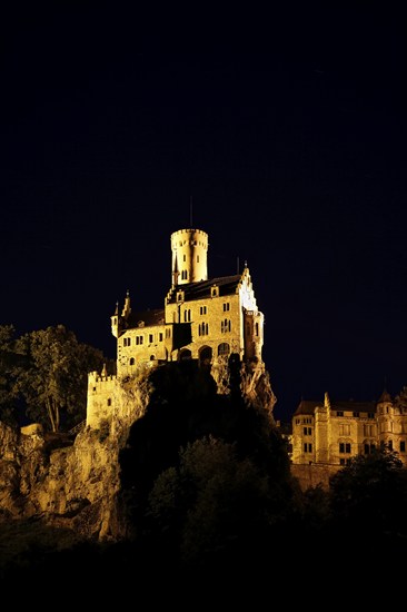 Lichtenstein Castle, night shot, artificial light, fairytale castle of Württemberg, illuminated, mood, romantic, historicist building, gerobau on the right, landmark of the Swabian Alb, Honau, Lichtenstein, district of Reutlingen, Baden-Württemberg, Germany, Europe