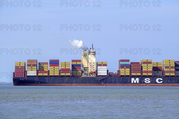 Swiss MSC container ship, containership of the Mediterranean Shipping Company S. A. loaded with containers, based in Geneva, Switzerland, Europe
