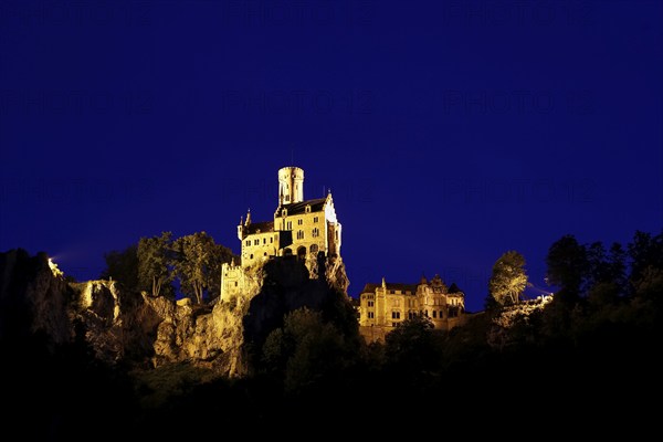 Lichtenstein Castle, night shot, artificial light, fairytale castle of Württemberg, illuminated, mood, romantic, historicist building, gerobau on the right, landmark of the Swabian Alb, Honau, Lichtenstein, district of Reutlingen, Baden-Württemberg, Germany, Europe
