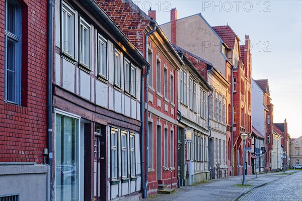 Half-timbered houses in the street Altes Dorf, a street with cobblestones, in the old town centre of Stendal in the Altmark. Hanseatic town of Stendal, Saxony-Anhalt, Germany, Europe