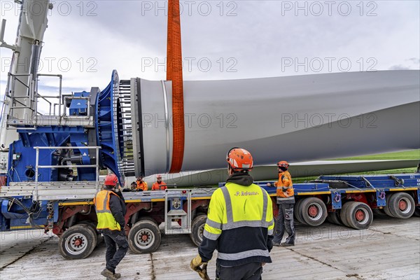 Preparation for the transport of a 68 metre long blade, a wind turbine, with a self-propelled Blade-Lifter vehicle, over a 40 km long route in the Bergisches Land, through towns, villages, over country roads, narrow through roads, to the construction site of the wind turbine near Hagen, North Rhine-Westphalia, Germany, Europe