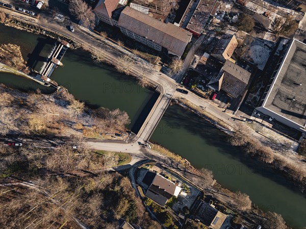 Bird's eye view of a bridge over a river with neighbouring roads and vehicles, Nagold, Black Forest, Germany, Europe