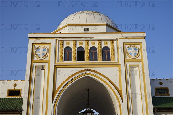 Market hall, Nea Agora, close-up of a historic building with dome, central windows and coat of arms, blue sky, Rhodes old town, Rhodes town, Rhodes, Dodecanese, Greek Islands, Greece, Europe