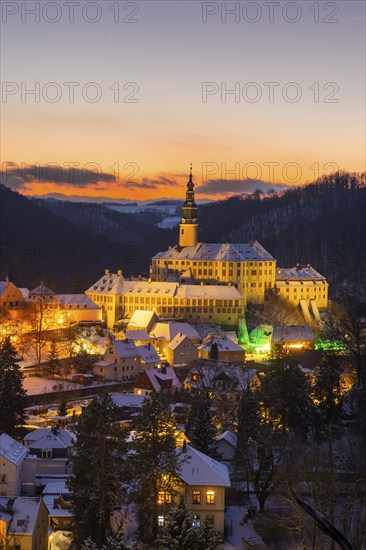 Winter evening in the Müglitz valley, impressively illuminated Weesenstein Castle at the blue hour, Weesenstein, Saxony, Germany, Europe