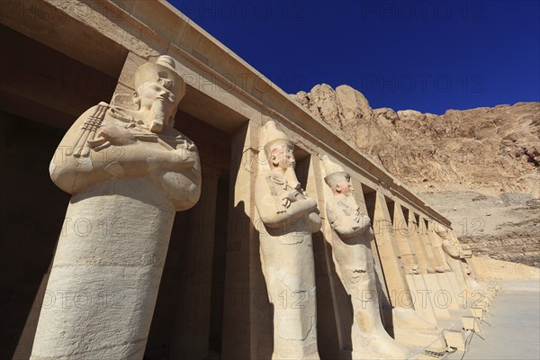Part of the temple complex, statues of Hatshepsut at the mortuary temple of Hatshepsut, Hatshepsut is the best preserved temple in Deir el-Bahari on the west bank of the Nile in Thebes, Africa, Egypt, Upper Egypt, Africa