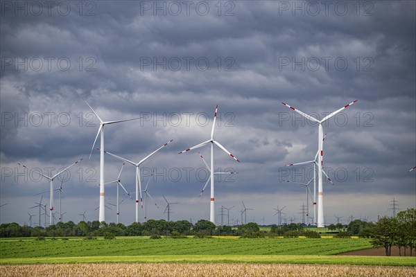 Wind farm east of Geilenkirchen, dark storm clouds, strong wind, North Rhine-Westphalia, Germany, Europe