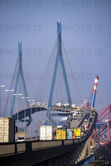 Traffic on the Köhlbrand Bridge in the port of Hamburg, spans the 325 m wide Köhlbrand, an arm of the Süderelbe, the bridge is over 3600 metres long, 53 metres above the water, piers 135 m high, more than 30, 000 vehicles use the B3 bridge daily, important connection to the port, it is dilapidated, to be rebuilt, Hamburg, Germany, Europe