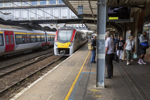 British Rail Class 755 Stadler bi-modal train arriving at railway station Ipswich, Suffolk, England, UK