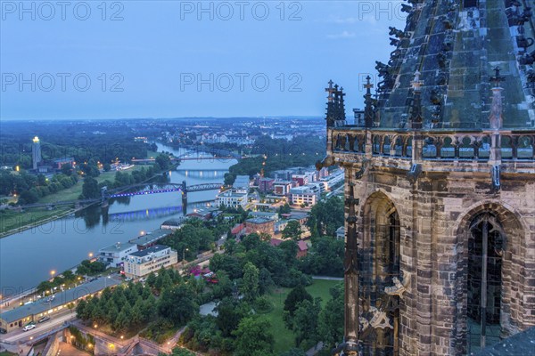 View from Magdeburg Cathedral onto the Elbe with illuminated lift bridge, star bridge and Albin Müller Tower on the left, Magdeburg, Saxony-Anhalt, Germany, Europe