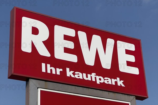 Signboard billboard with logo of retail chain retailer REWE ihr Kaufpark, Germany, Europe
