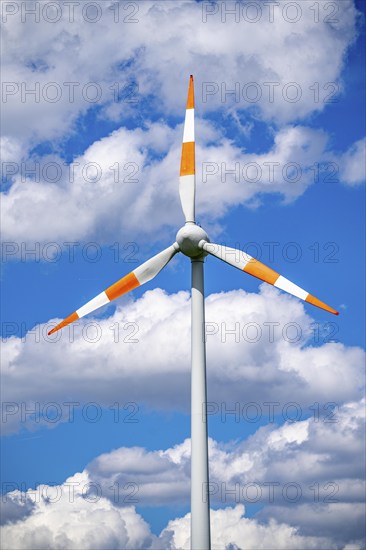 Wind turbine, wind energy plant from the manufacturer Enercon, blue sky with many white clouds, near Schermbeck, North Rhine-Westphalia, Germany, Europe
