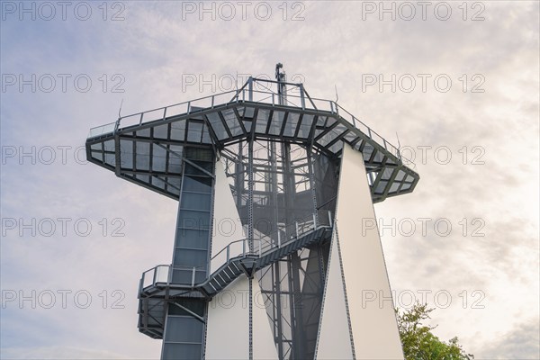 A modern metal observation tower with stairs that stands out against the sky, Rappbodetalsperre, Harz Mountains, Germany, Europe
