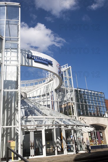 Modern glass and steel architecture of the Buttermarket shopping centre in the town centre of Ipswich, Suffolk, England, UK