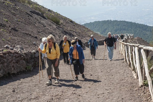 Tourists walking on a path to Vesuvius, near Naples, Parco Nazionale del Vesuvio, Campania, Italy, Europe