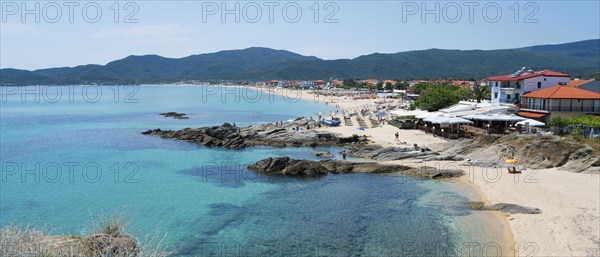 Wide coastal landscape with turquoise water and mountains in the background, lined with beaches, Sarti, Sithonia, Chalkidiki, Halkidiki, Central Macedonia, Greece, Europe