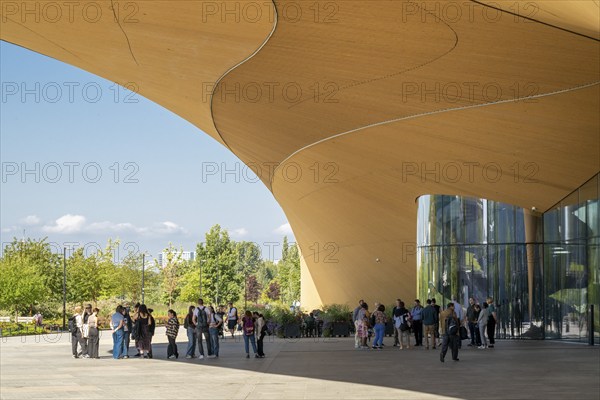 People in front of Oodi Central Library and Cultural Centre, design by ALA Architects, Helsinki, Finland, Europe