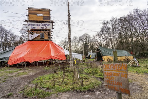 Camp of climate activists in the rest of the village of Lützerath, the last place to be excavated at the Garzweiler 2 open-cast lignite mine, North Rhine-Westphalia, Germany, Europe