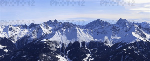 Alpine panorama with snow-covered mountain peaks in winter. Taken in the ski resort of Serfaus Fiss Ladis (Tyrol, Austria)