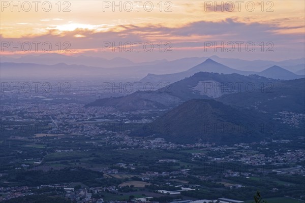 View of the densely populated Neapolitan region and the mountains near Caserta in the hazy evening light. San Felice a Cancello, Caserta, Campania, Italy, Southern Europe, Europe