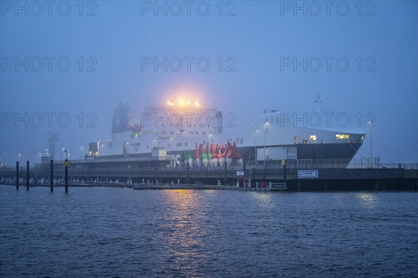 Thick fog in winter, hangs over the mouth of the Elbe into the North Sea, DFDS ferry viewpoint Alte Liebe in Cuxhaven, Lower Saxony, Germany, Europe