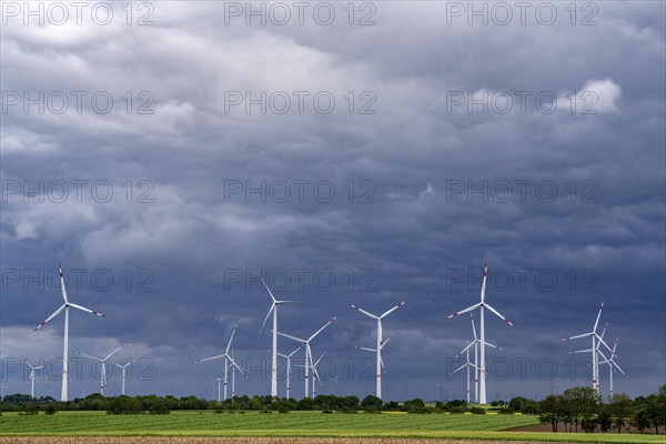 Wind farm east of Geilenkirchen, dark storm clouds, strong wind, North Rhine-Westphalia, Germany, Europe