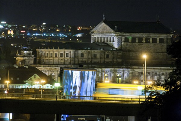 In the early hours of the morning, a section of the Carola Bridge collapsed for unknown reasons. Over a length of around 100 metres, the section on which the trams normally run collapsed into the Elbe. Image of the intact bridge from 2011 with the film nights, Carola Bridge in Dresden, Dresden, Dresden, Saxony, Germany, Europe