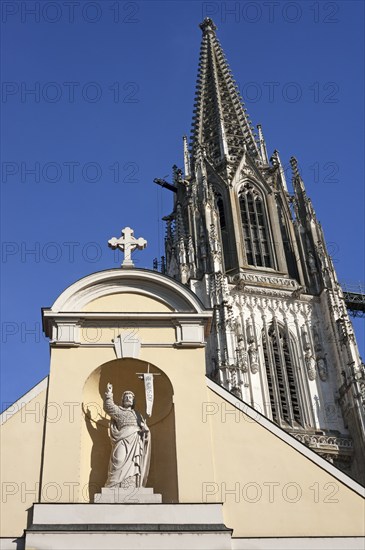 Sculpture of Christ at St John's Chapel, completely rebuilt in 1766, on the right a tower from St Peter's Cathedral, Regensburg, Upper Palatinate, Bavaria, Germany, Europe