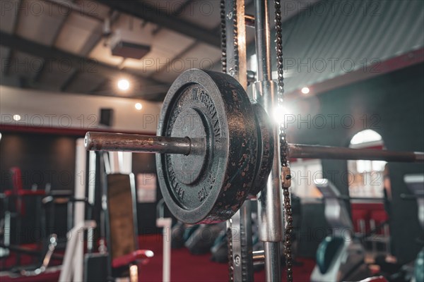 Dumbbell bar with weight in the centre of a fitness room, Historic Fitness Studio, Bulls Fit, Mannheim, Germany, Europe