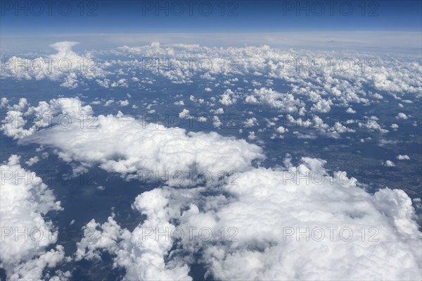 View from 13000 feet about 4000 metres above sea level Aerial view of on clouds in front Altostratus in the background Cirrocumulus, international