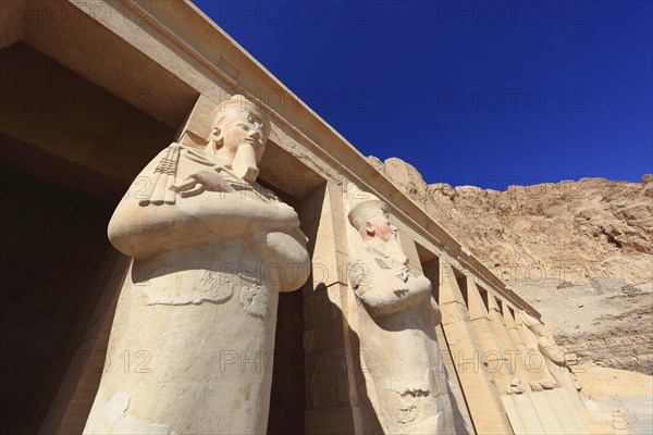 Part of the temple complex, statues of Hatshepsut at the mortuary temple of Hatshepsut, Hatshepsut is the best preserved temple in Deir el-Bahari on the west bank of the Nile in Thebes, Africa, Egypt, Upper Egypt, Africa