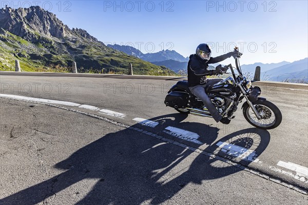 A favourite leisure activity for motorcyclists is a tour over winding Alpine passes. Furka Pass, Realp, Canton Uri, Switzerland, Europe