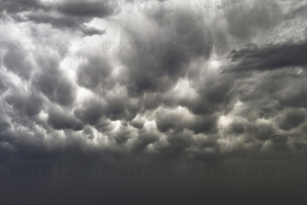 Gathering thunderclouds Clouds forming after storm warning Thunderstorm warning grey dark clouds shortly in front of thunderstorm from storm, dark sky in the background, Germany, Europe