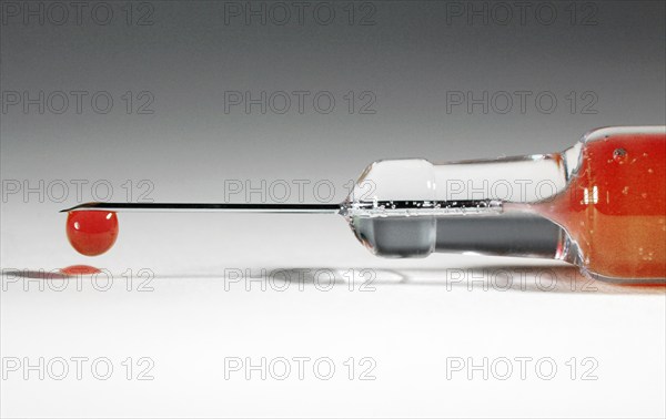 A syringe with donated blood, blood drop, Vienna, Austria, Europe
