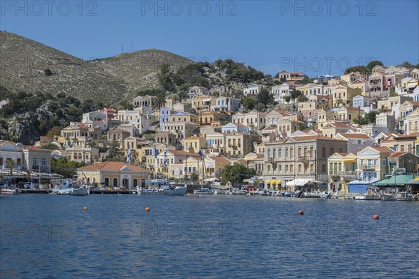 View of the harbour and Symi town, Symi island, Dodecanese, Greek islands, Greece, Europe