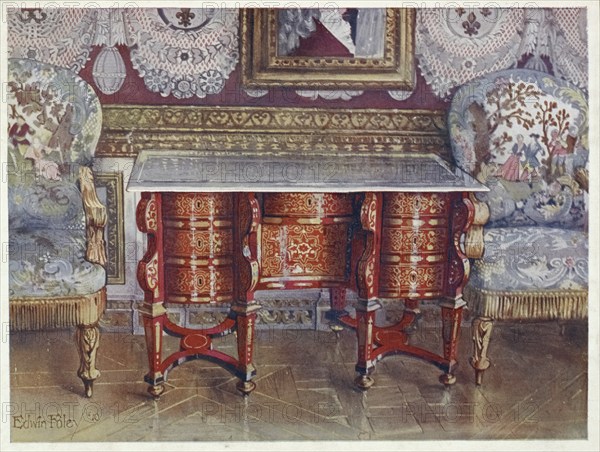 Furniture from around the turn of the century 1900, desk with kneehole in red tortoiseshell. Lacquered steel top. Boulle. Gilded armchairs, covered with tapestry (1910, 1911), kneehole writing table in red tortoiseshell. Gilt fauteuils, upholstered in tapestry (1910, 1911) .jpg