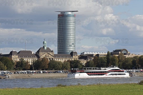 Event ship MS Rheingalaxie sails in front of ERGO tower block and district government, Düsseldorf, North Rhine-Westphalia, Germany, Europe