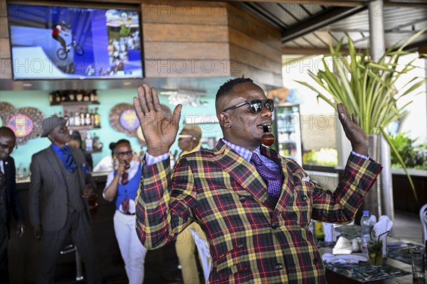 Sapeur, member of the Société des Ambianceurs et des Personnes élégantes (SAPE), society of entertainers and stylish people, Brazzaville, Republic of Congo