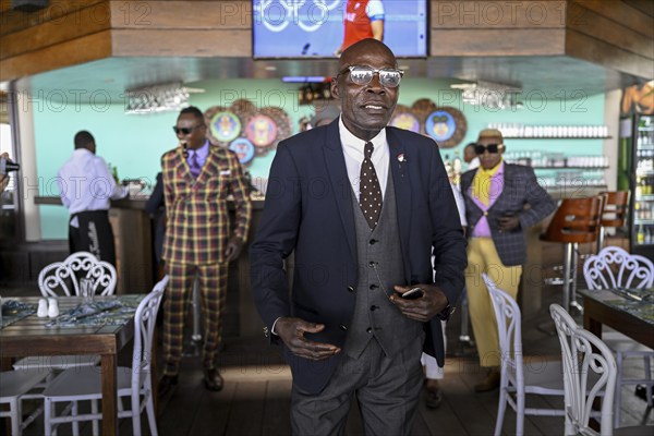 Sapeur, member of the Société des Ambianceurs et des Personnes élégantes (SAPE), society of entertainers and stylish people, Brazzaville, Republic of Congo