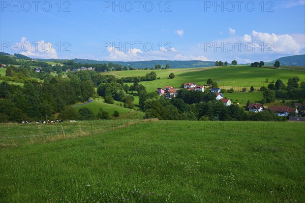 Green hills with scattered rural houses under a clear blue sky, Wachtküppel, Gersfeld, Rhön, Hesse, Germany, Europe