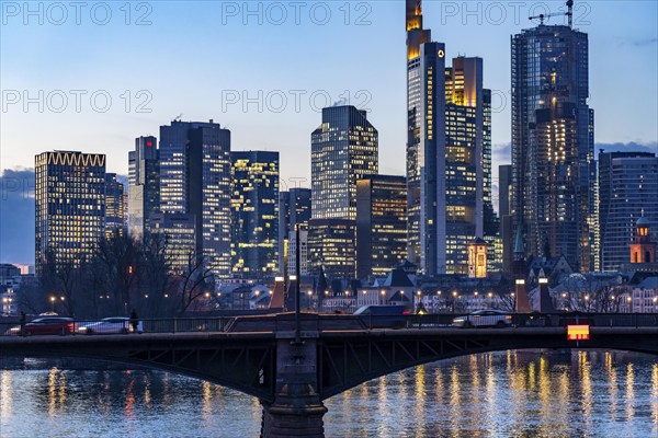 Skyline of the city centre of Frankfurt am Main, river Main, dusk, Ignatz-Bubis-Brücke, Hesse, Germany, Europe