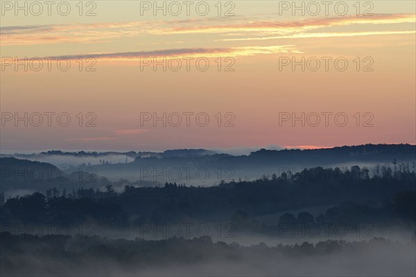Sunrise, fog rising over the Arnsberg Forest nature park Park, North Rhine-Westphalia, Germany, Europe