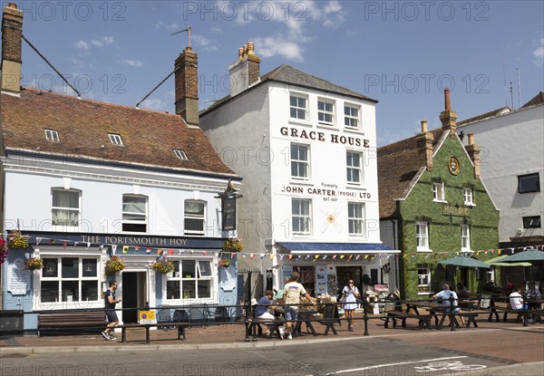 Pubs and old historic buildings on quayside at Poole harbour, Poole, Dorset, England, UK