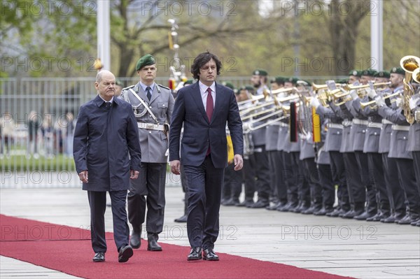 Federal Chancellor Olaf Scholz (SPD) welcomes Irakli Kobakhidze, Prime Minister of Georgia, to the Federal Chancellery with military honours in Berlin, 12.04.2024