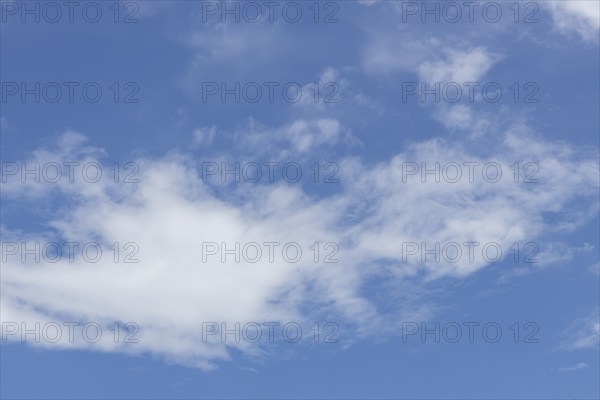 Stratocumulus white clouds in a blue sky, England, United Kingdom, Europe