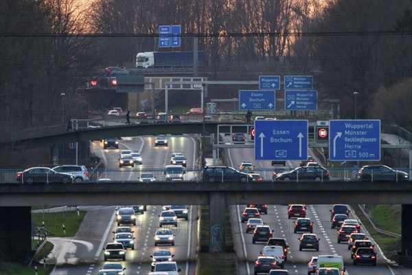 Motorway A40, Ruhrschnellweg, near Bochum, dense evening traffic, in front of the motorway junction Bochum, A43, view in west direction, North Rhine-Westphalia, Germany, Europe