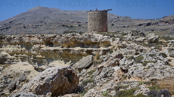 Medieval ruin on a rocky terrain with a clear blue sky, windmill, ruin, near Lindos, Lindos, Rhodes, Dodecanese, Greek Islands, Greece, Europe
