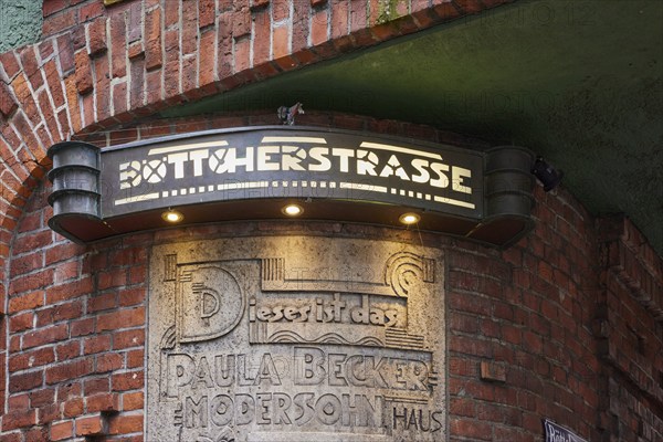 Artistic illuminated street sign Böttcherstrasse in Bremen, Hanseatic City, State of Bremen, Germany, Europe
