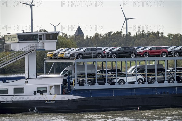 Car transporter Freighter Forenso, on the Rhine near Rees, brings Ford Explorer e-cars from the Ford plant in Cologne to the seaports of the Netherlands for onward transport overseas, North Rhine-Westphalia, Germany, Europe