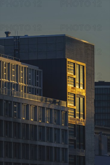 DOCK office tower, facade in the evening light, architect Jo Coenen, Unterbilk, Kaistraße 2 in the Media Harbour, Düsseldorf, North Rhine-Westphalia, Germany, Europe