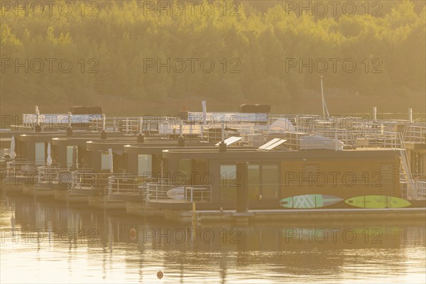 Bärwalder See Landscape Park, post-mining landscape, remnant hole of Bärwalde open-cast mine, Klitten harbour, floating holiday homes, Klitten, Saxony, Germany, Europe